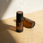 Charisma Candles Oudh & Bergamot fragrance oil bottle with a sleek design, showcasing the luxurious scent profile.