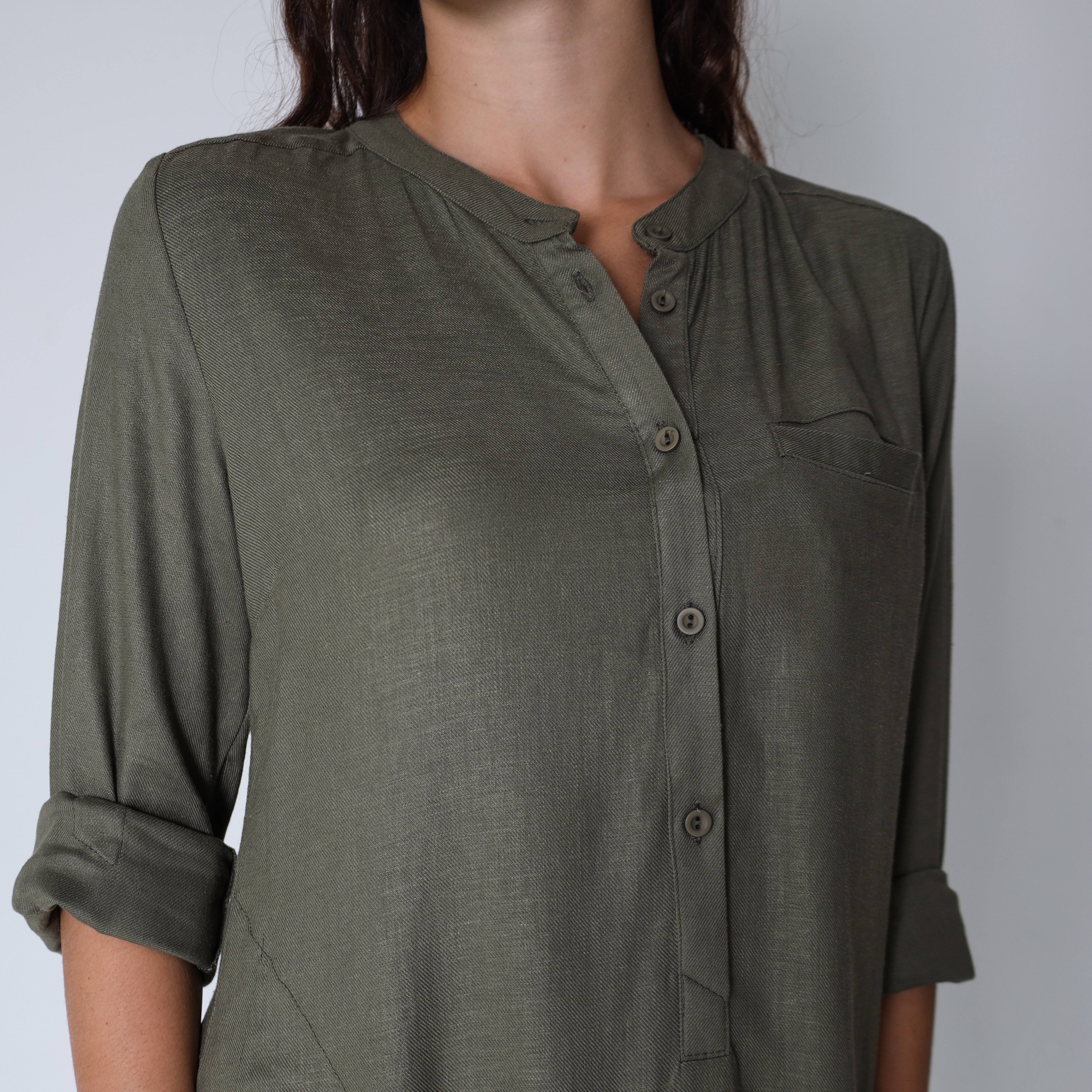 Shea green dress by Trinity, stylish consignment women's dress with a fitted silhouette and elegant design.