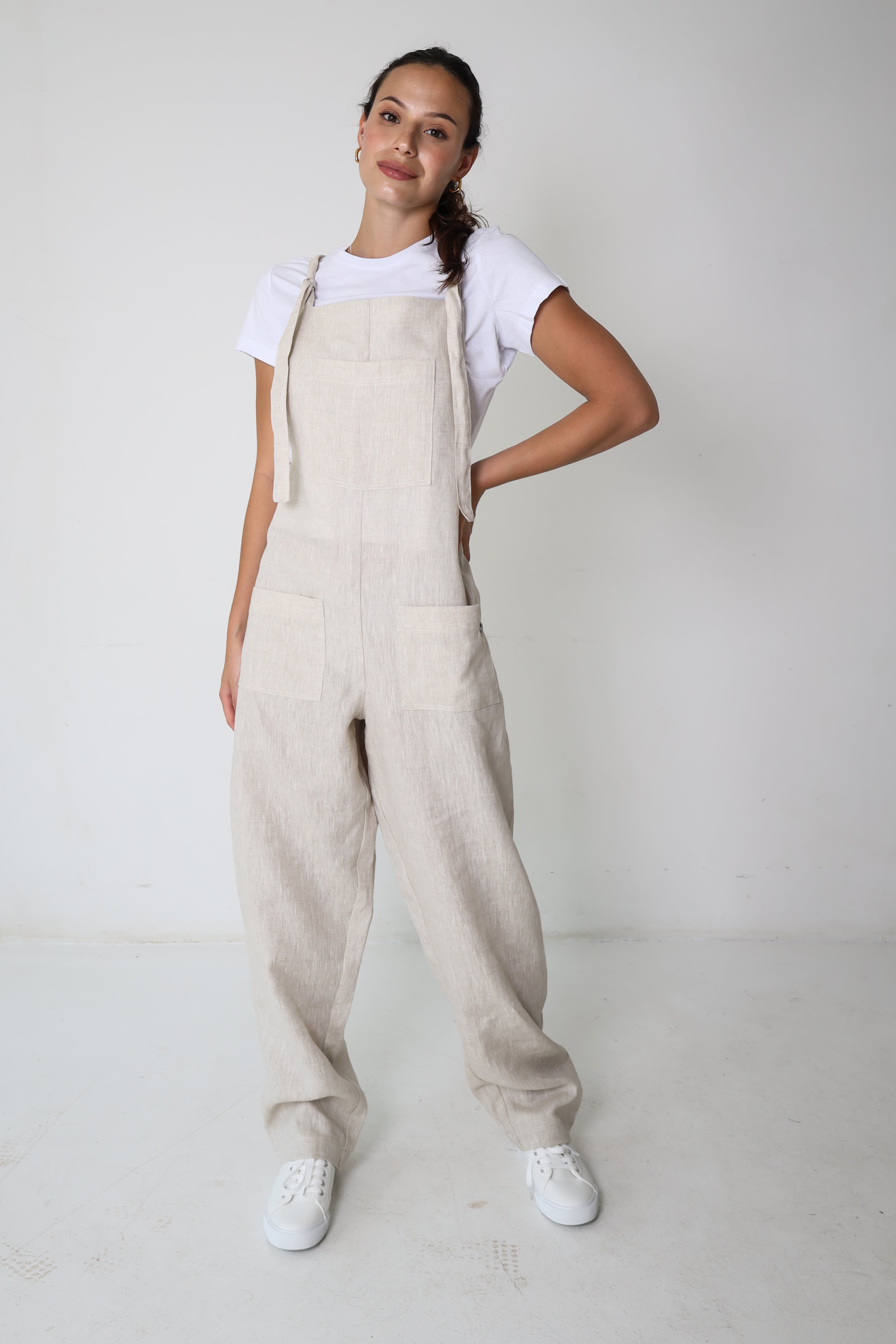 Di Ti Amo Clothing Nix Dungaree Long in natural color, showcasing the stylish, casual denim overalls with adjustable straps and side pockets.