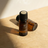 Charisma Candles jasmine fragrance oil in a clear glass bottle with a black cap, suitable for aromatherapy and home scents.