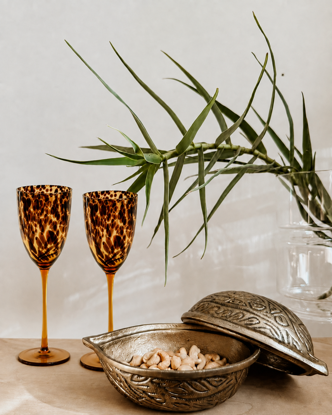 Tortoiseshell wine glass from Tusker Trading featuring a classic stemmed design and a tortoiseshell pattern.