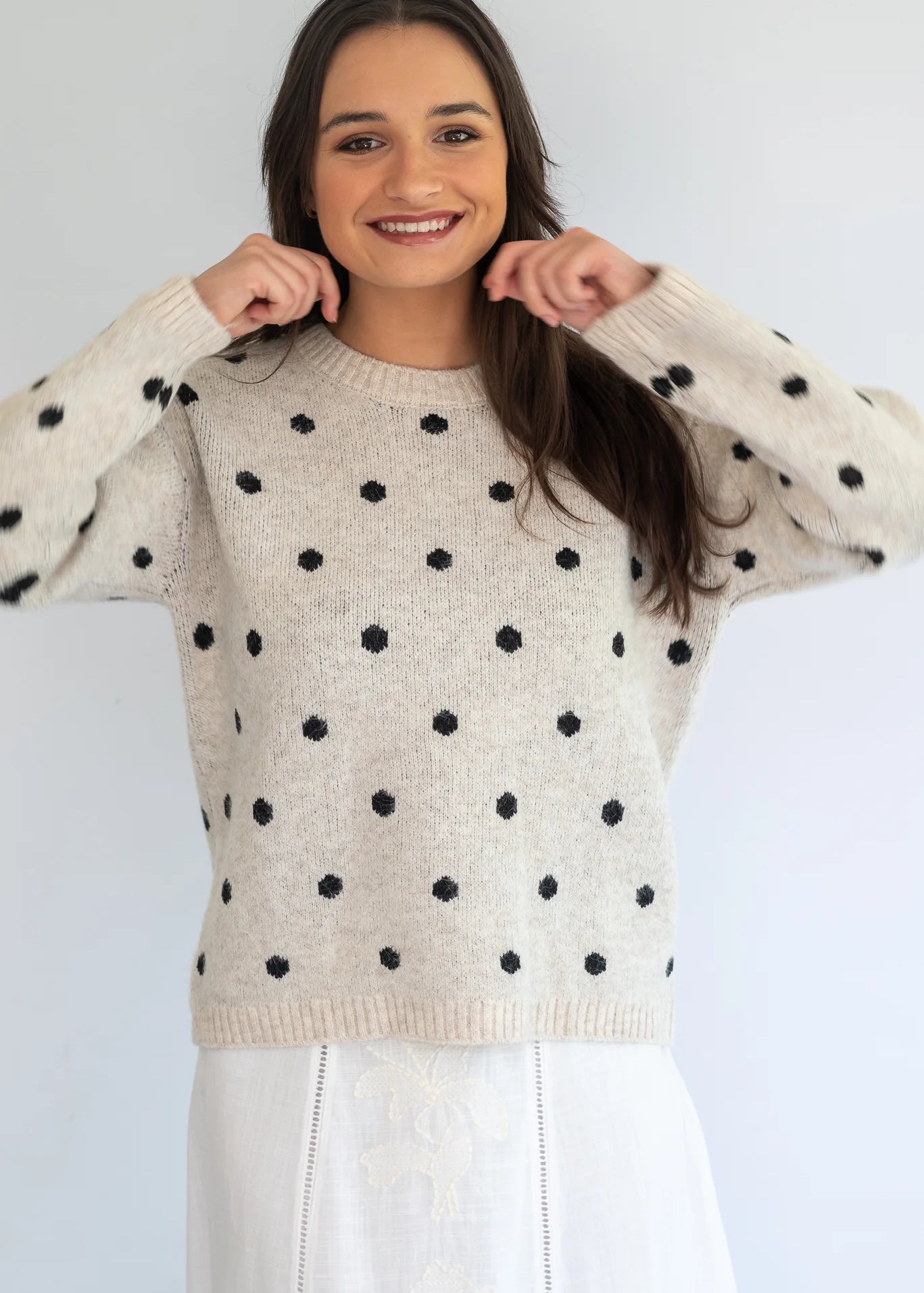 Grey polka knit jersey by Coco & Salt featuring a cozy, soft fabric with a classic polka dot pattern on a stylish jersey top.