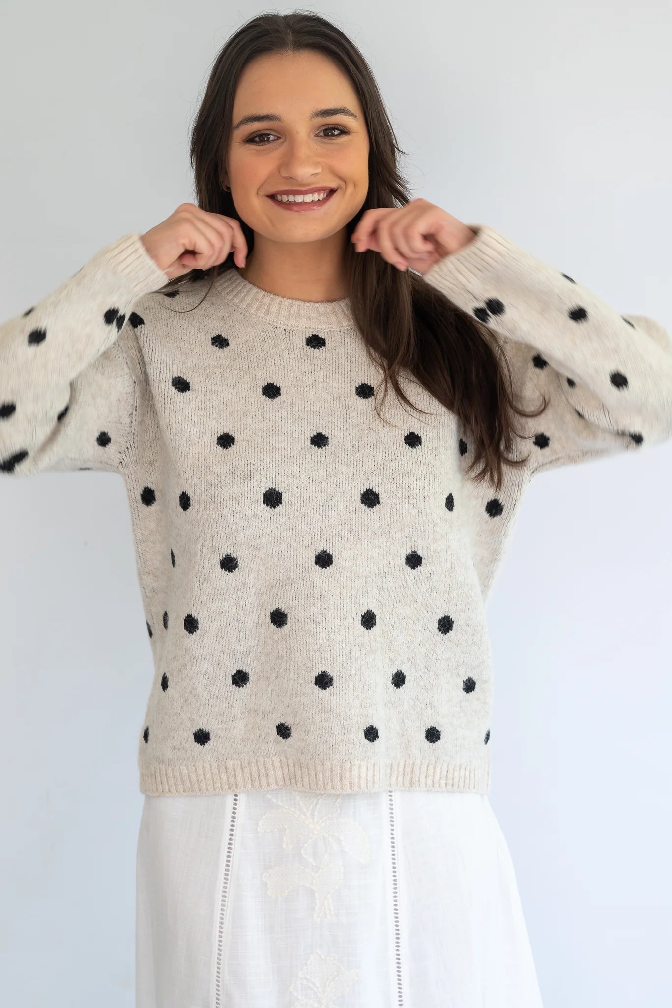 Grey polka knit jersey by Coco & Salt featuring a cozy, soft fabric with a classic polka dot pattern on a stylish jersey top.
