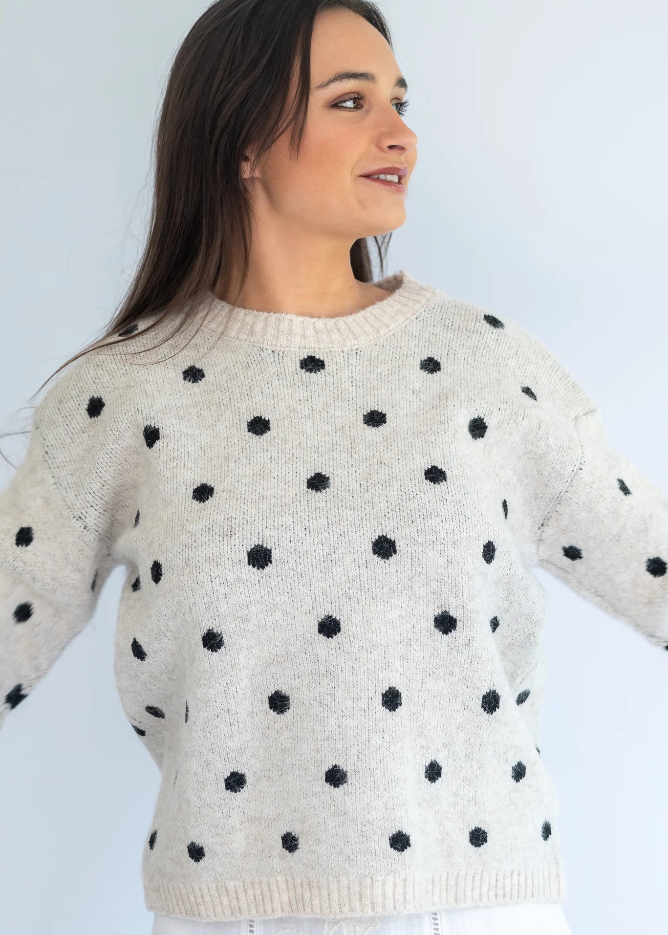 Grey Polka Knit Jersey by Coco & Salt, featuring a soft knit fabric with polka dot pattern, shown on a flat lay.