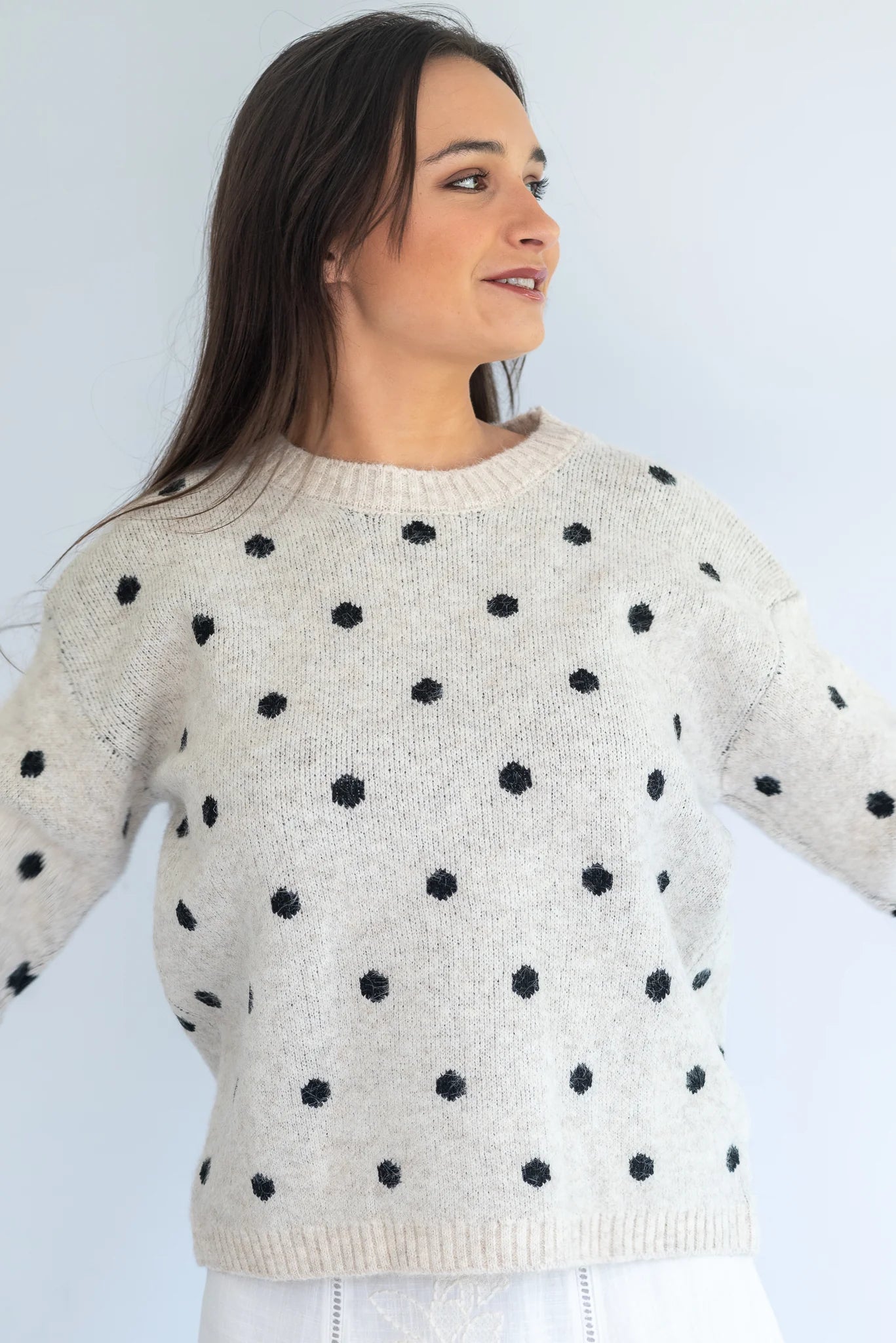 Grey Polka Knit Jersey by Coco & Salt, featuring a soft knit fabric with polka dot pattern, shown on a flat lay.