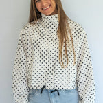 Coco & Salt Ella Jacket in Polka pattern, displayed on a hanger with close-up of fabric and design details.