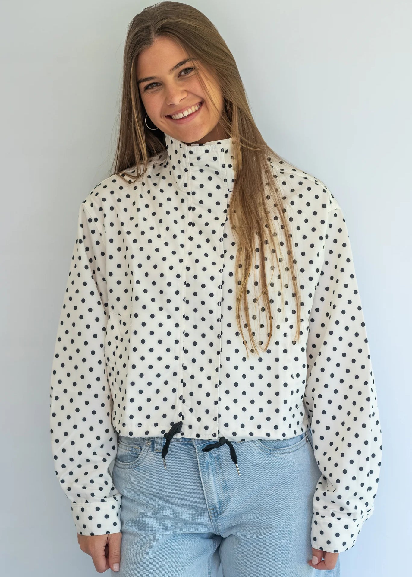 Coco & Salt Ella Jacket in Polka pattern, displayed on a hanger with close-up of fabric and design details.