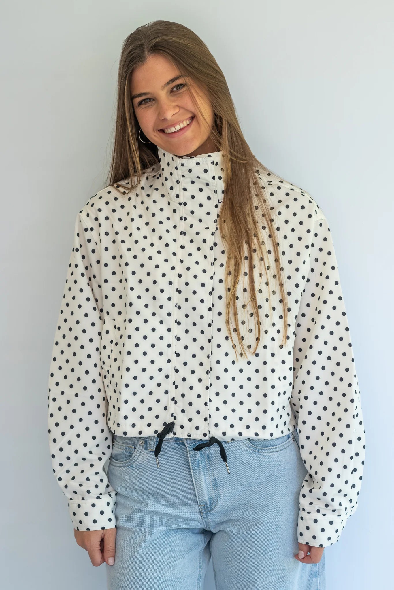 Coco & Salt Ella Jacket in Polka pattern, displayed on a hanger with close-up of fabric and design details.