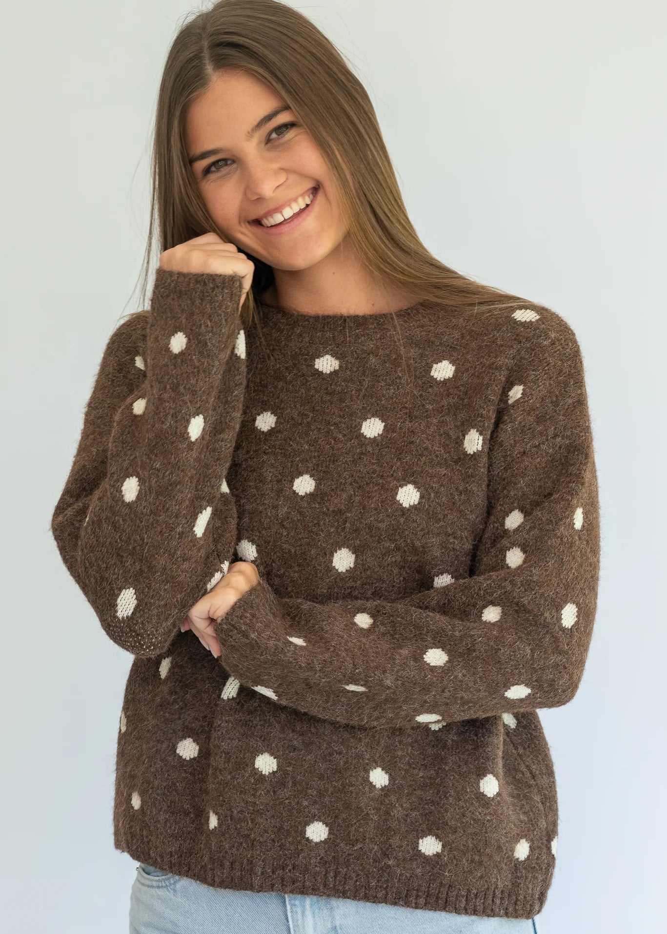 Polka Knit Jersey in Choc by Coco & Salt, displayed in a close-up image showcasing its textured knit fabric and pattern.