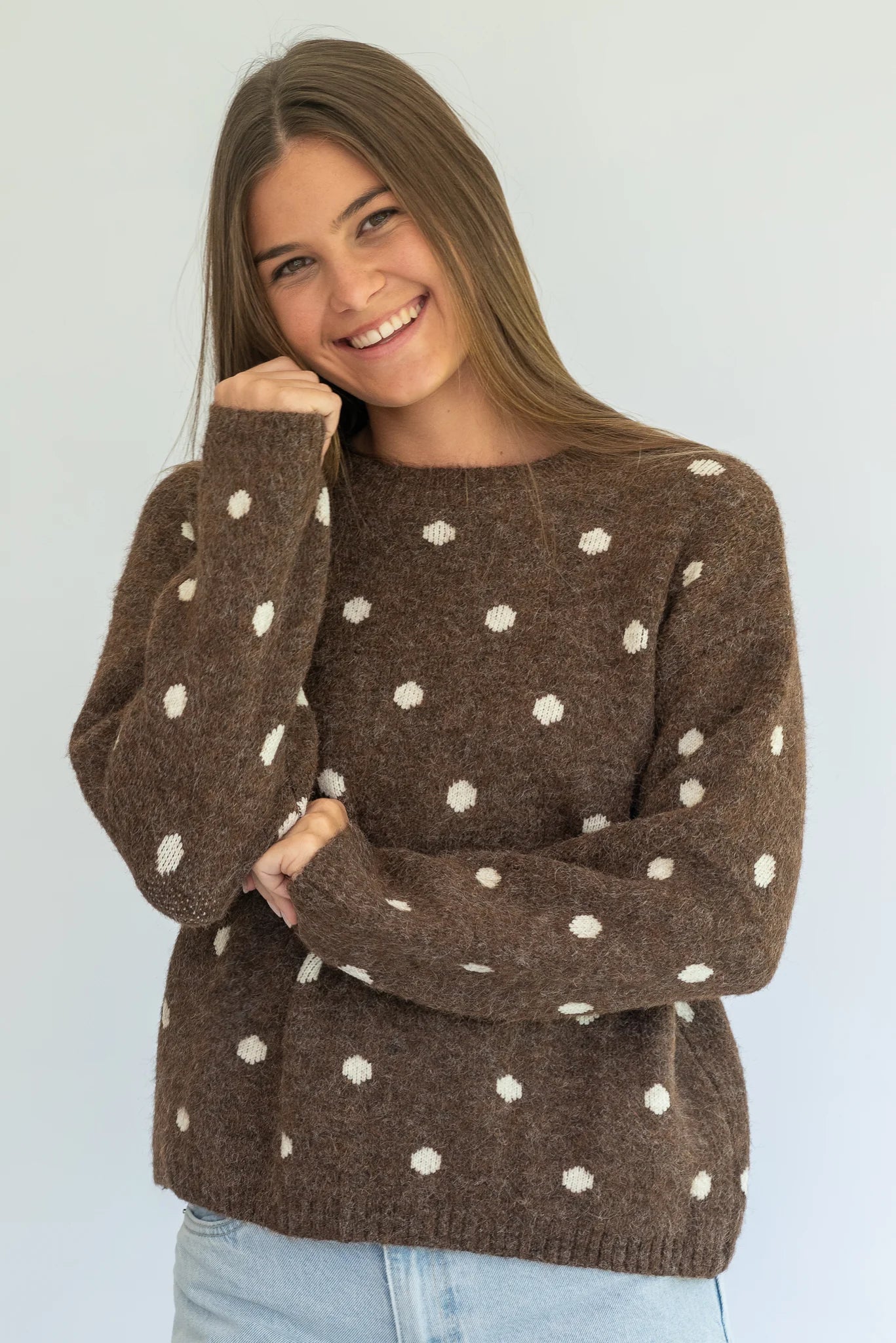Polka Knit Jersey in Choc by Coco & Salt, displayed in a close-up image showcasing its textured knit fabric and pattern.