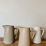 Raw clay milk jug by Pret-A-Pot, handcrafted ceramic cod-shaped pitcher for milk or liquids, with a rustic, artisanal finish.