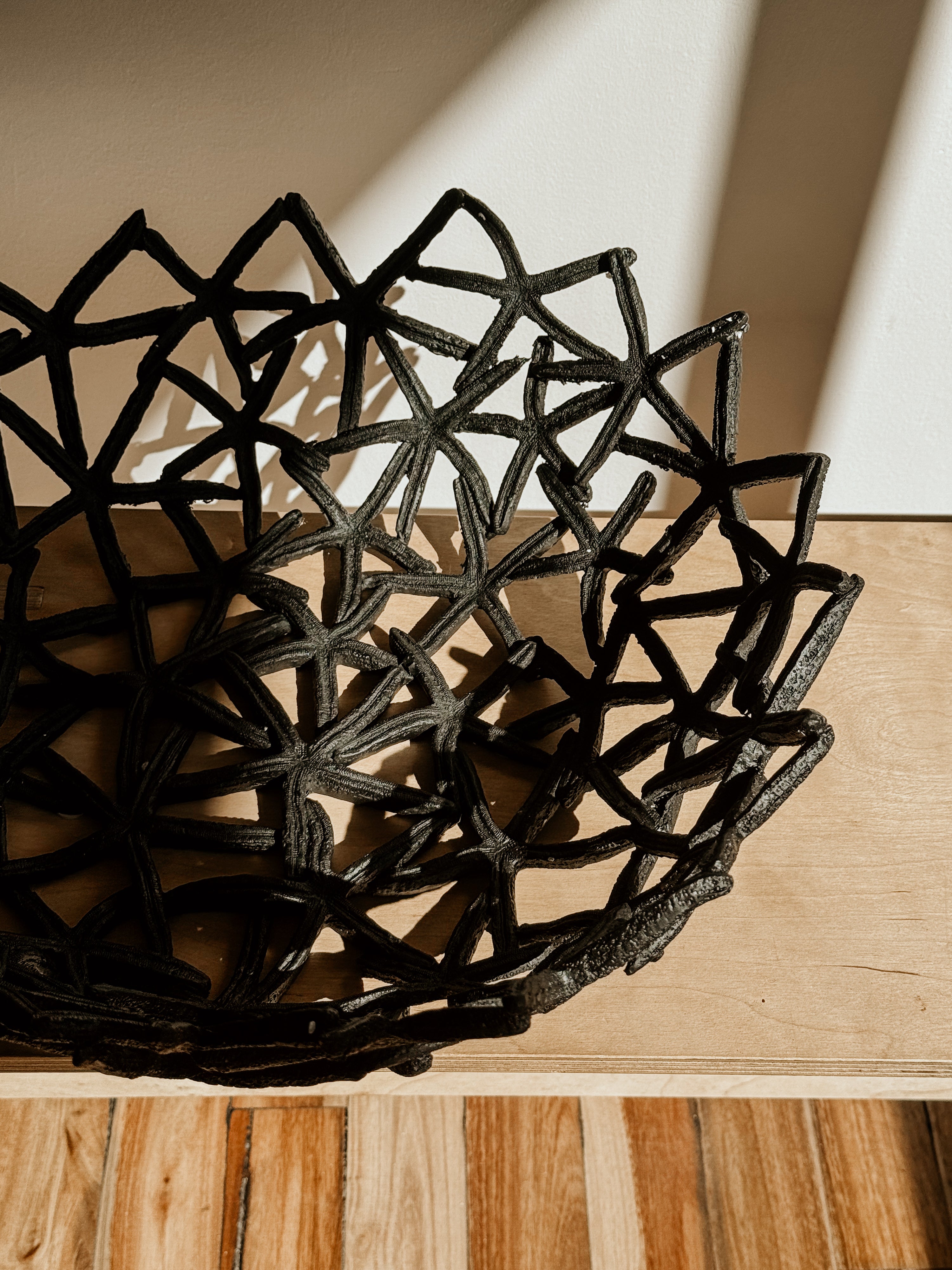 Black Coral Starfish Bowl by Spaces & Places, decorative ocean-inspired ceramic bowl with starfish design.