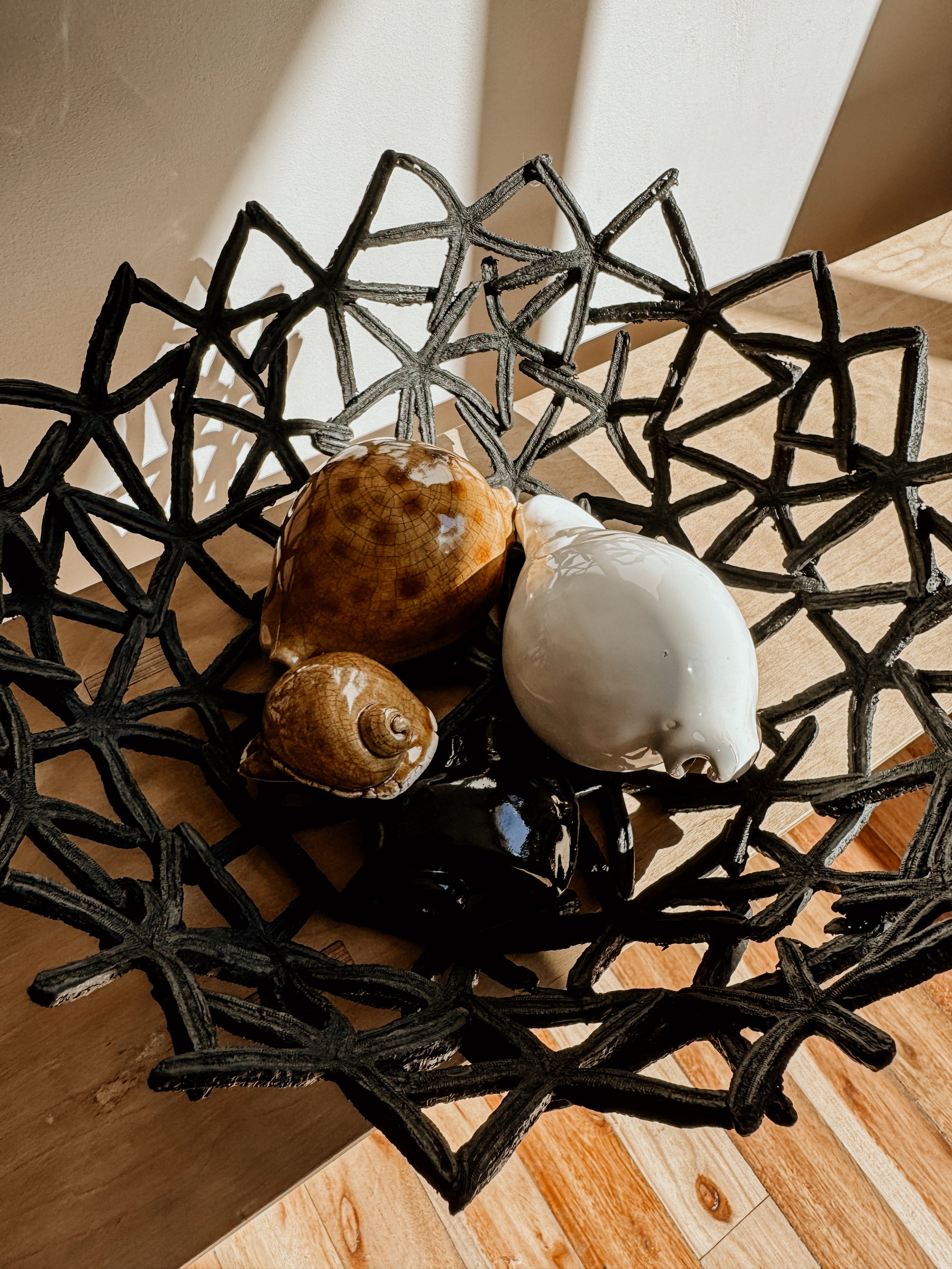 Periwinkle and brown consignment jewelry by Delphine, featuring mixed materials and elegant design.