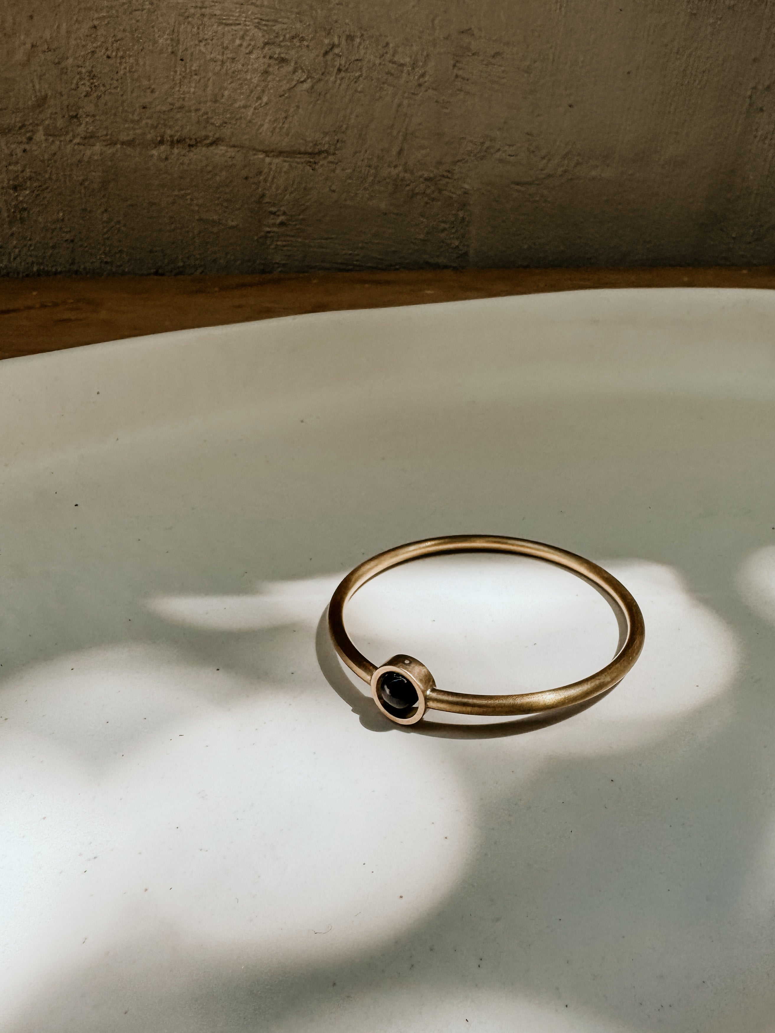 Gold Circle & Gem Bangle | Black