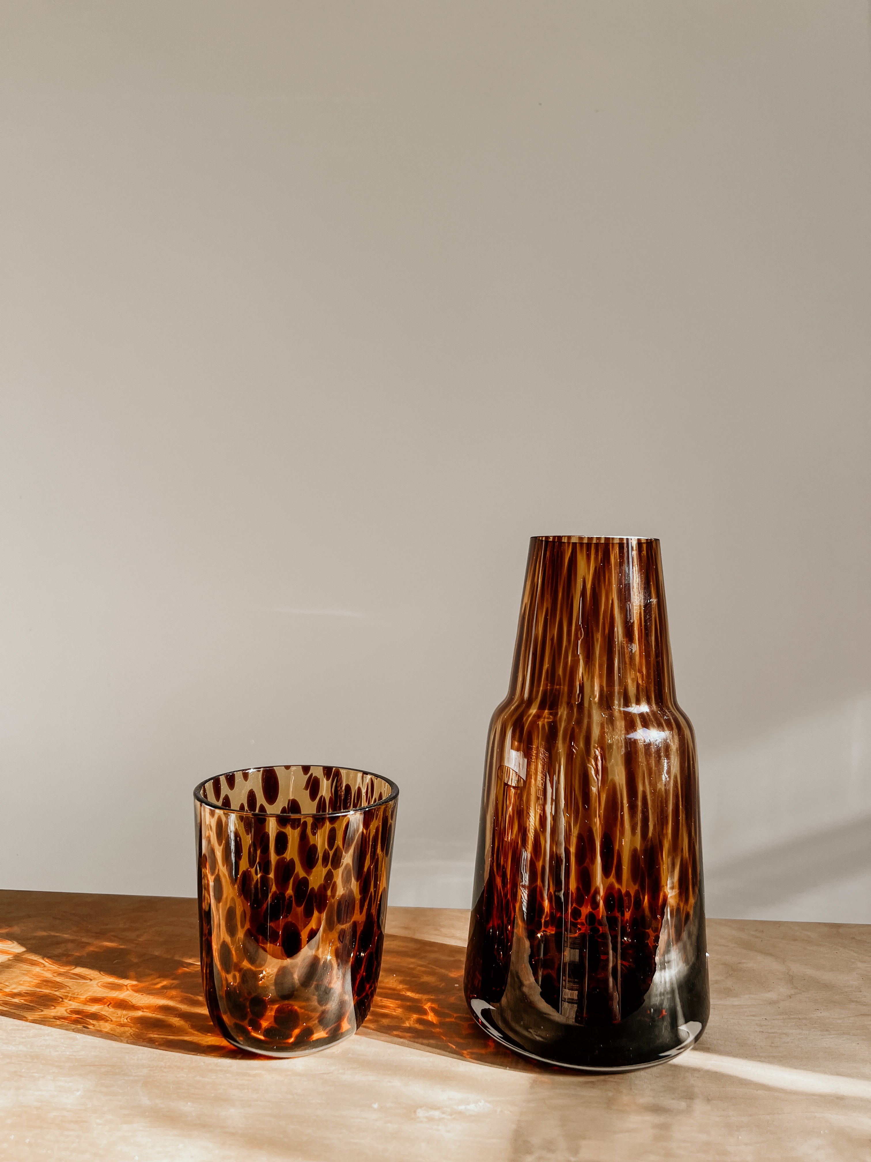 Tortoise shell Carrafe account holder by Tusker Trading, featuring a sleek design and secure storage for personal items.