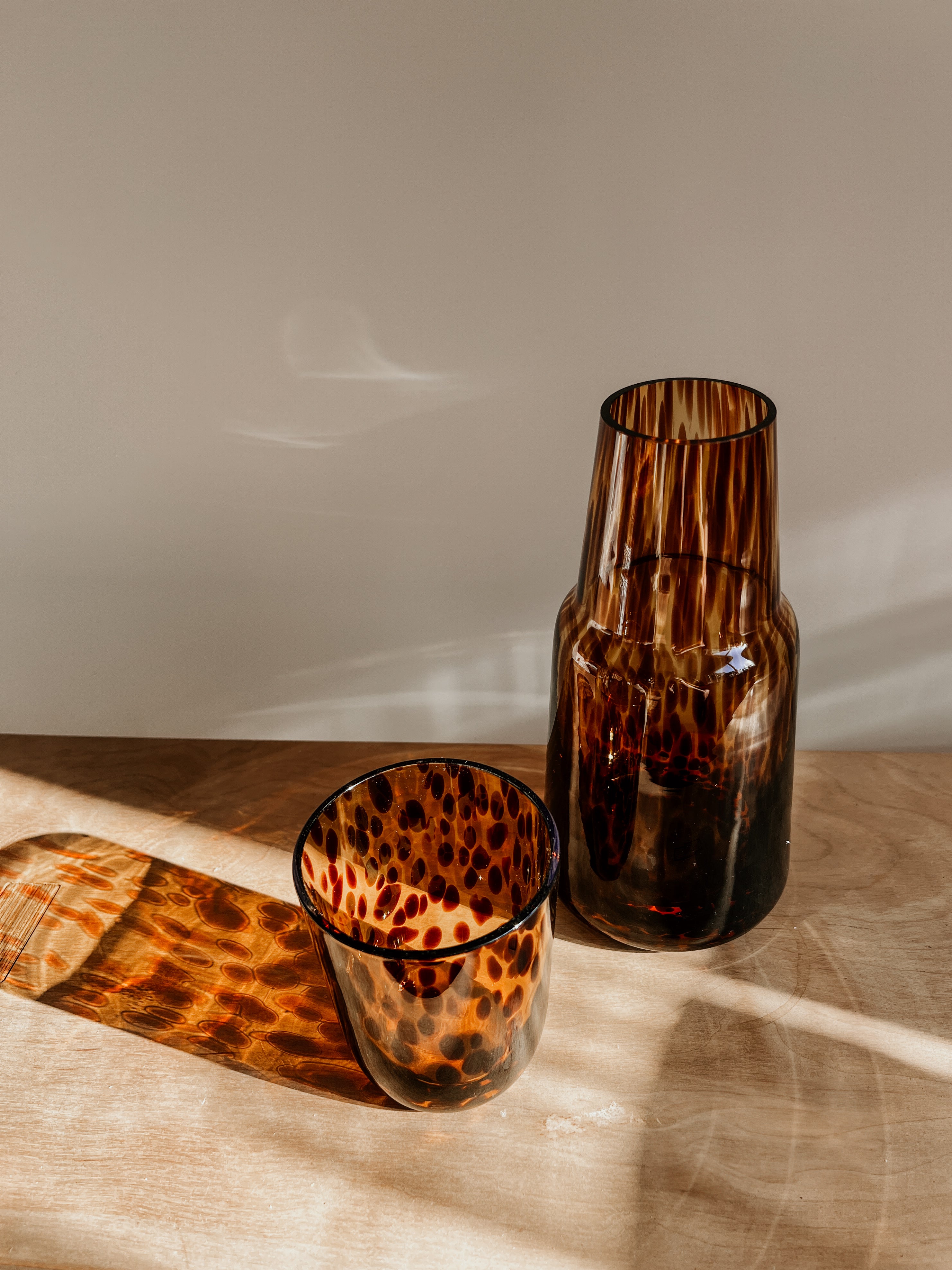 Tortoise shell Carrafe account holder by Tusker Trading with detailed tortoise shell pattern and smooth finish.