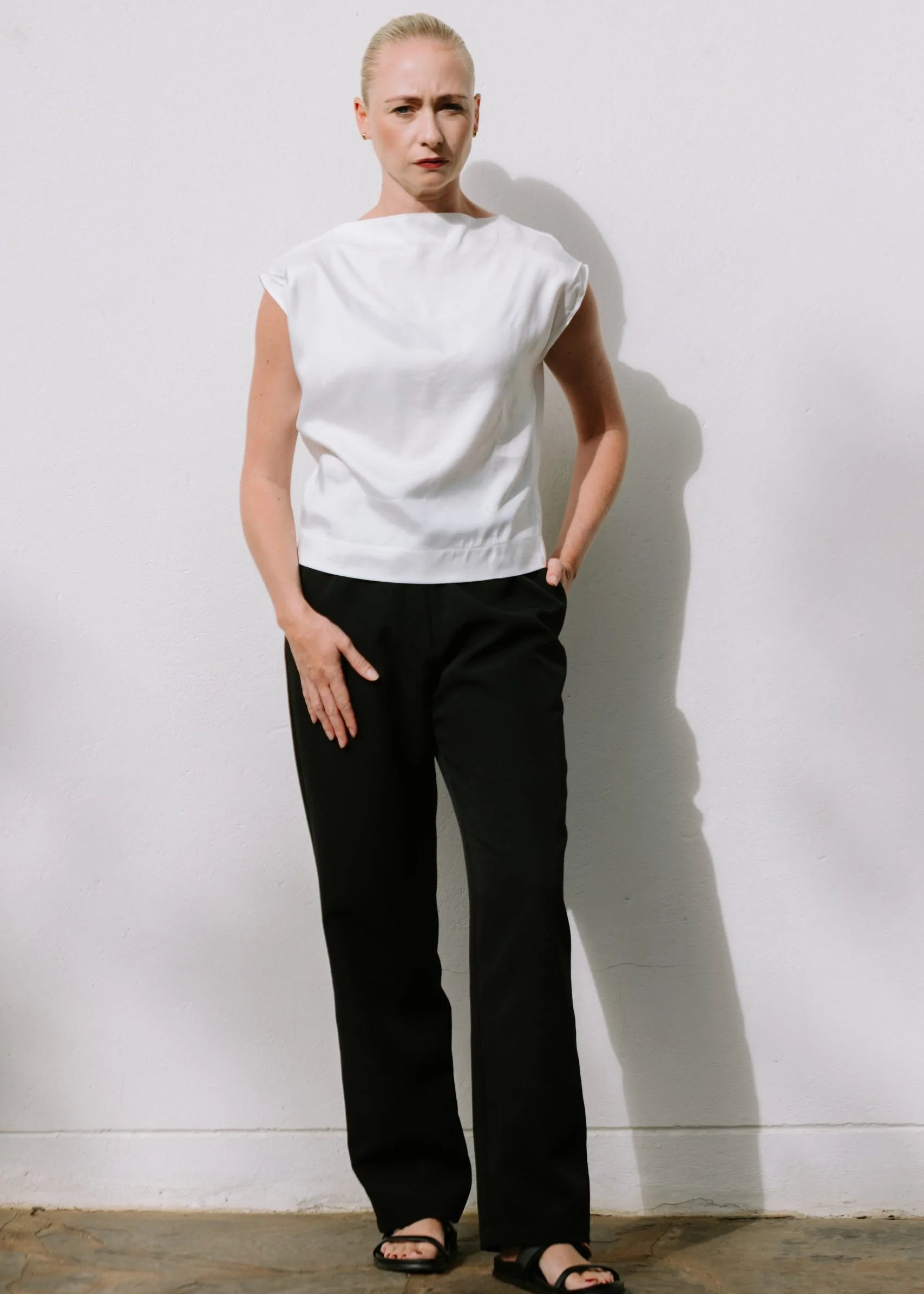 White Drape High Neck Top by Lika Designs, stylish consignment women's blouse with elegant draped neckline.