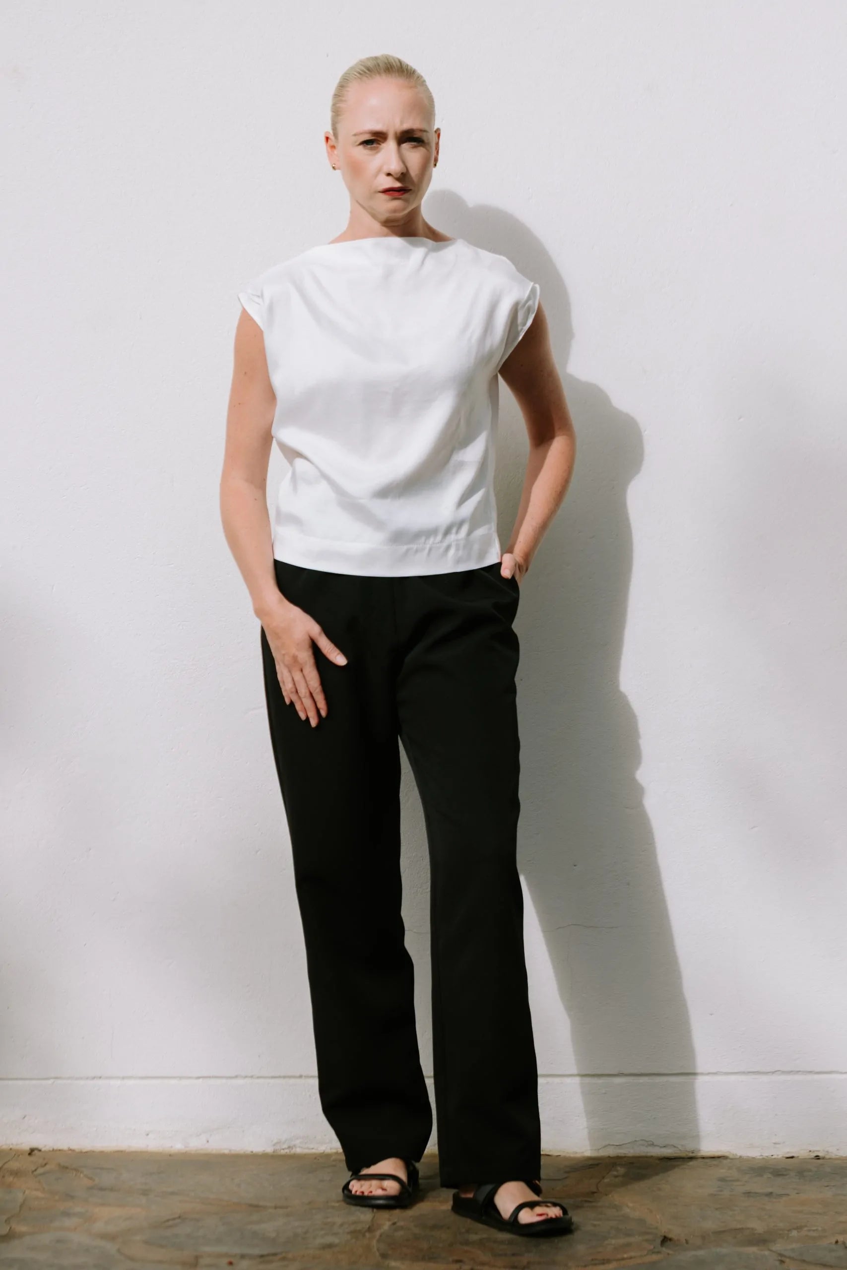 White Drape High Neck Top by Lika Designs, stylish consignment women's blouse with elegant draped neckline.