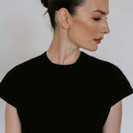 Black linen blend midi dress by Lika Designs, showcasing a stylish and comfortable consignment clothing option.