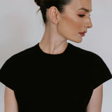 Black linen blend midi dress by Lika Designs, showcasing a stylish and comfortable consignment clothing option.