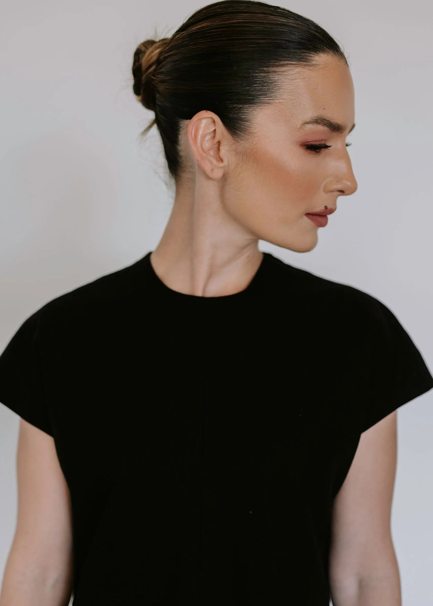 Black linen blend midi dress by Lika Designs, showcasing a stylish and comfortable consignment clothing option.