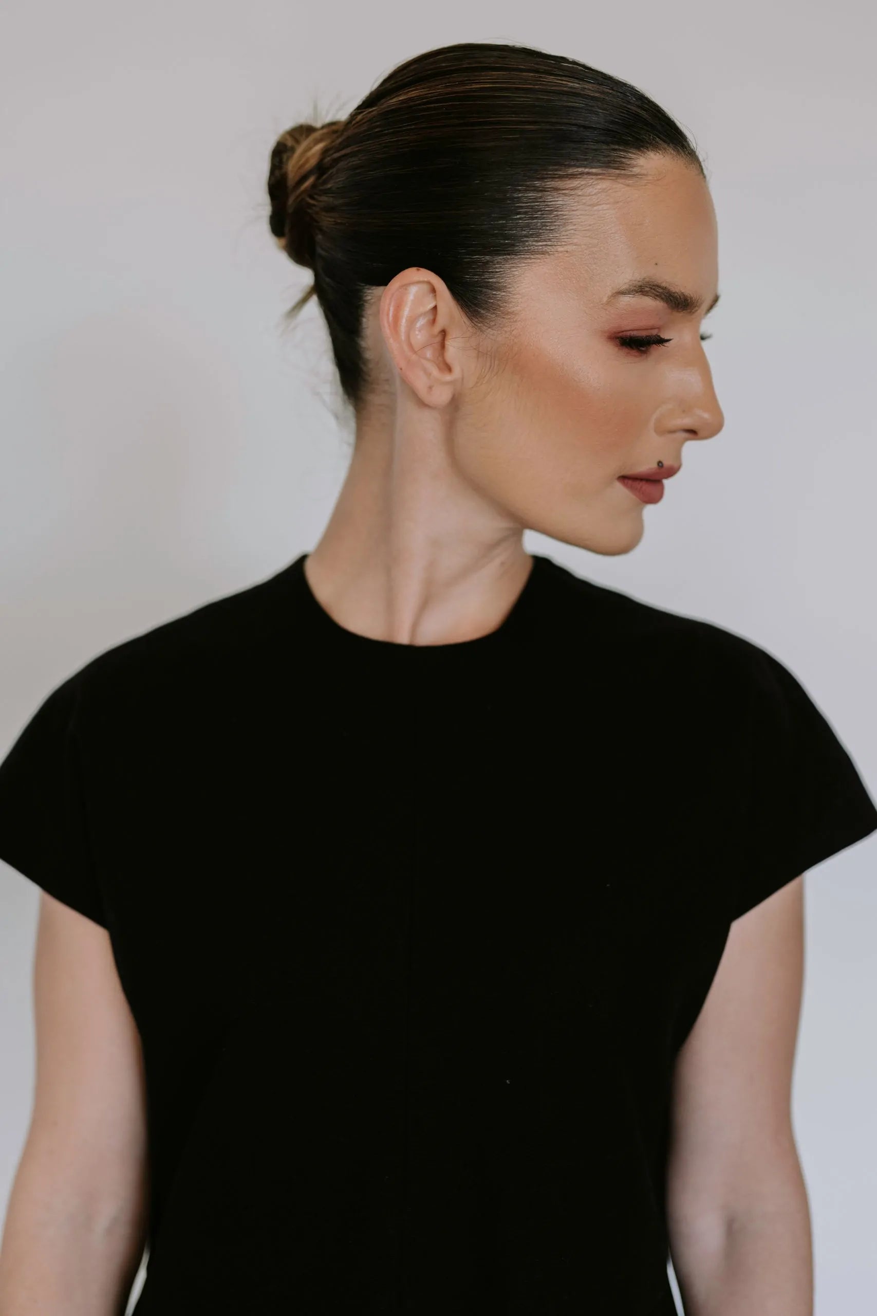 Black linen blend midi dress by Lika Designs, showcasing a stylish and comfortable consignment clothing option.