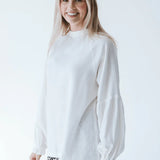 Reversible long sleeve shirt by Trinity in white, made from natural fabric, with cuffed sleeves, part of the Denny collection.