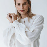 Trinity Denny Reversible Long Sleeve Shirt in white with natural viscose fabric, showcased as a versatile, stylish top for winter.