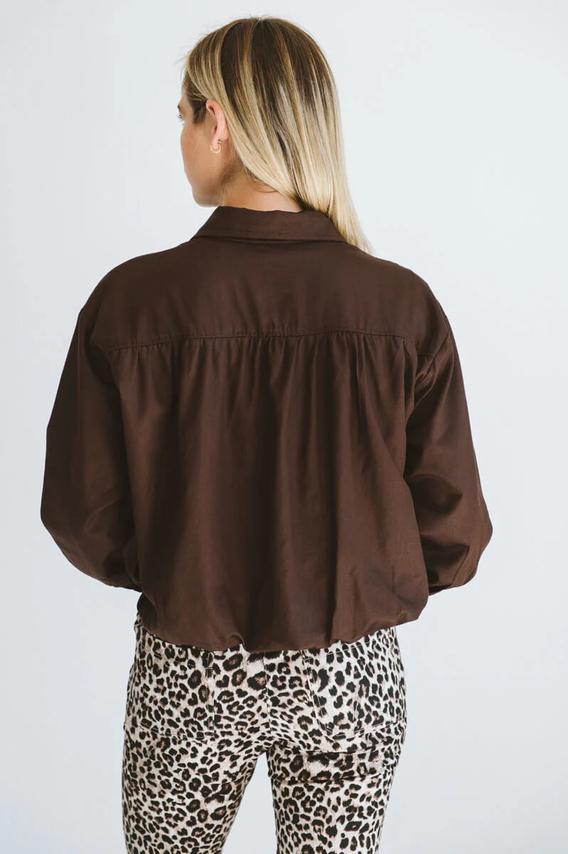 Trinity Page chocolate cotton long-sleeve collared shirt with pocket, from the Winter Collection 2026, made in South Africa.