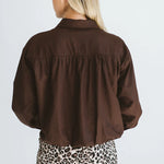 Trinity Page Shirt in chocolate cotton with long sleeves, collar, chest pocket, made in South Africa, from the 2026 winter collection.