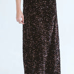 Close-up of Trinity chocolate sequins skirt from the Winter Collection, showcasing shiny, textured sequins on a stylish consignment piece.