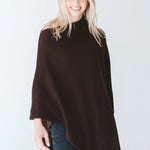 Trinity chocolate poncho made in South Africa, cozy and stylish outerwear accessory for cold weather, comfortable winter fashion.