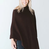 Trinity chocolate poncho made in South Africa, cozy and stylish outerwear accessory for cold weather, comfortable winter fashion.