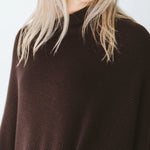 Chocolate Trinity poncho, cozy and stylish consignment outerwear, made in South Africa, perfect for cold weather and travel.
