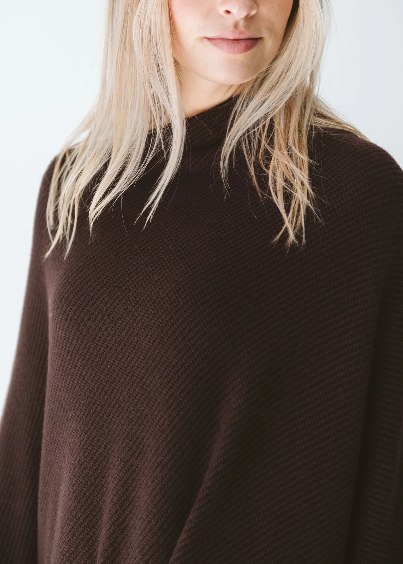 Chocolate Trinity poncho, cozy and stylish consignment outerwear, made in South Africa, perfect for cold weather and travel.