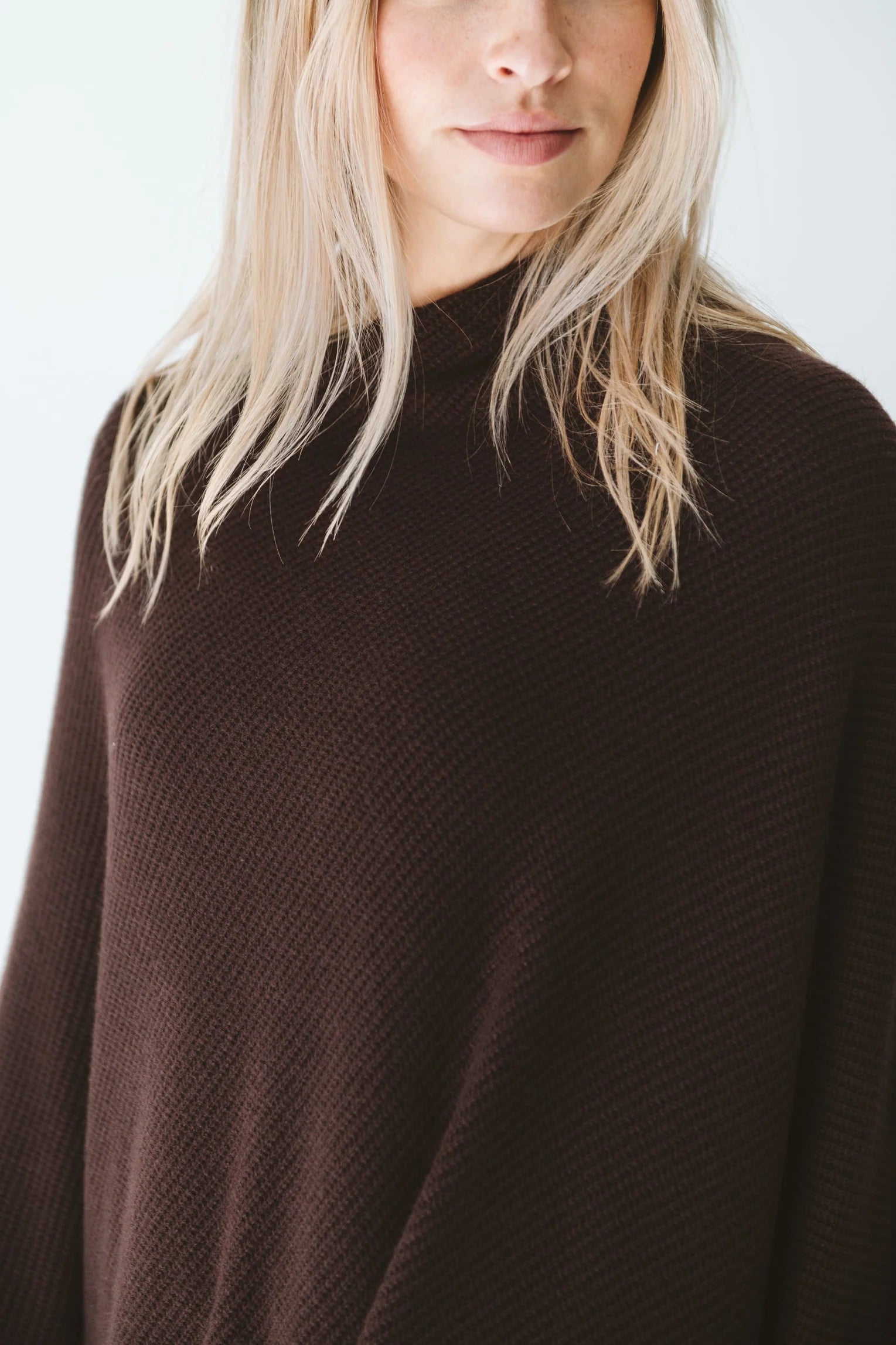 Chocolate Trinity poncho, cozy and stylish consignment outerwear, made in South Africa, perfect for cold weather and travel.