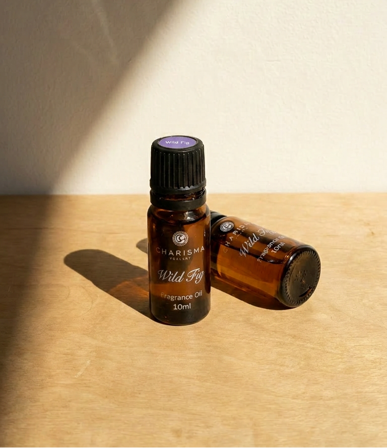 Charisma Candles Wild Fig fragrance oil bottle with a black cap and label, showcasing the aromatic oil for candles and home fragrances.