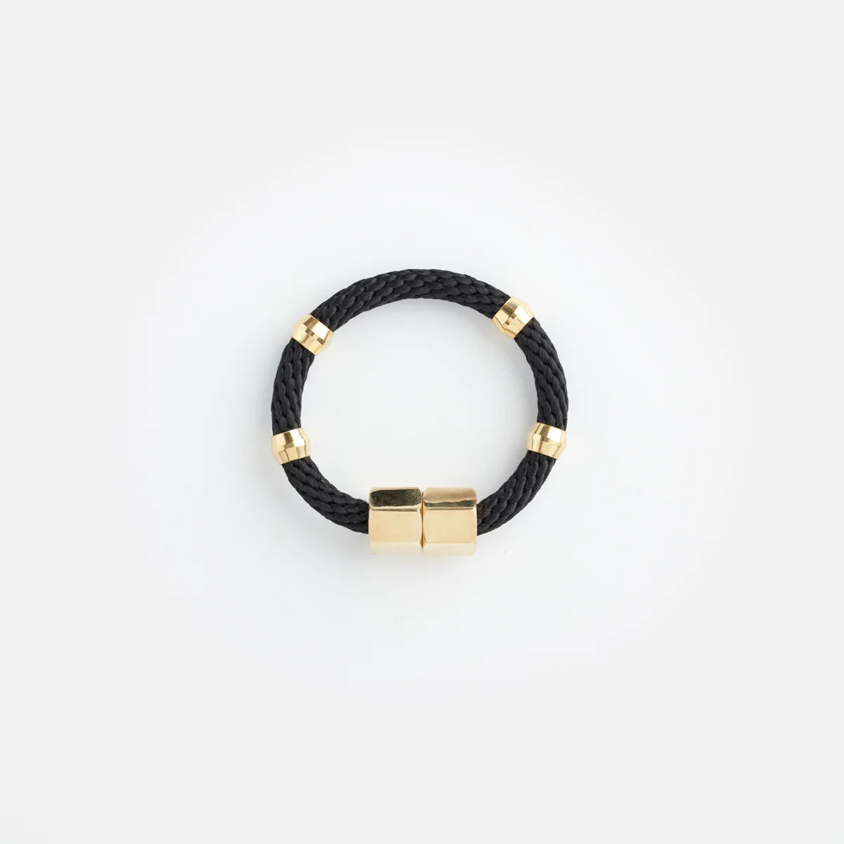 Pichulik Mer black bracelet made of cord with intricate woven details, styled on a wrist for a bohemian look.