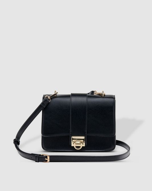 Black LouenHide Caprice consignment handbag with sleek leather design and silver hardware, shown from a front view.