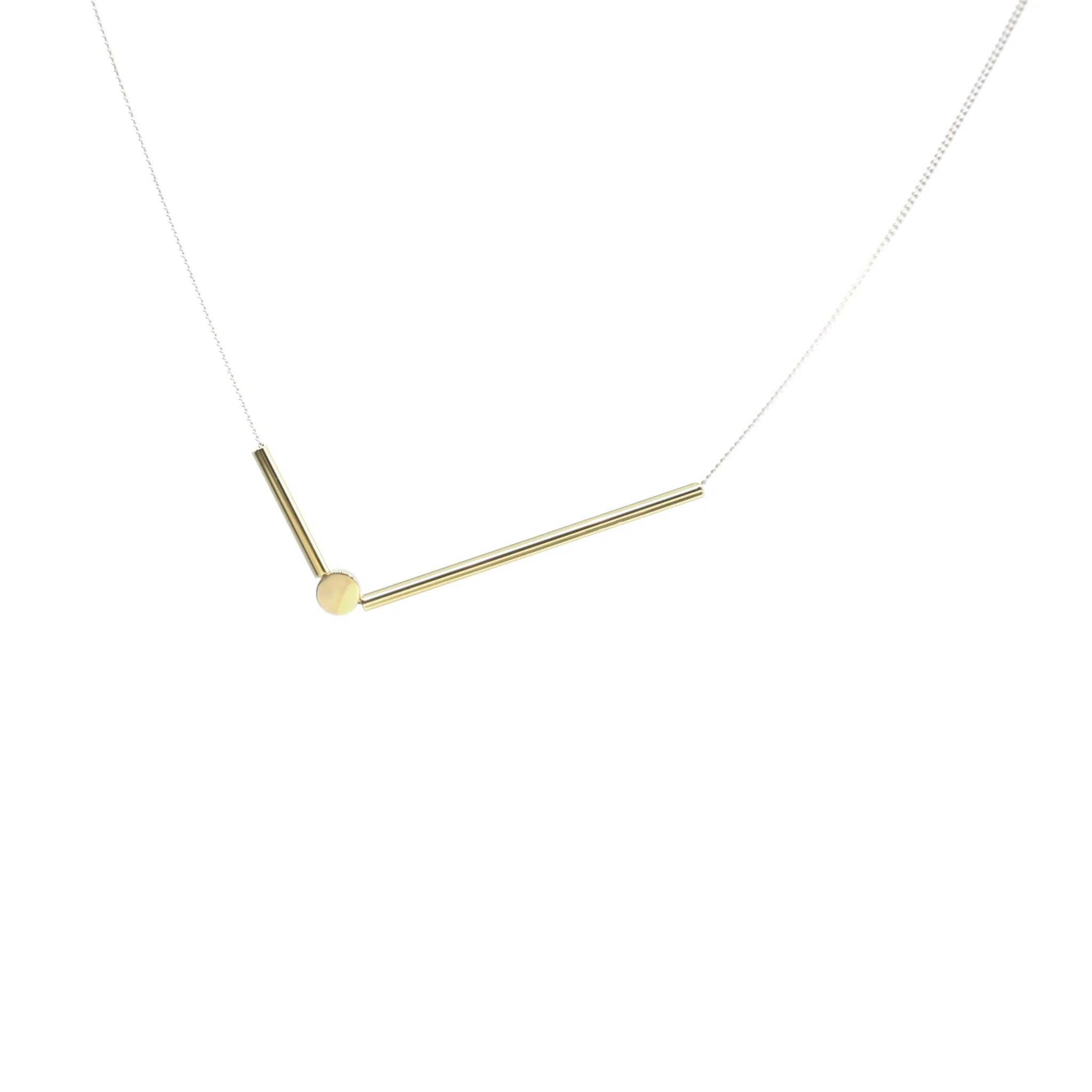 A Bird Named Frank Sticks & Stones necklace featuring layered stone and stick pendant on a delicate chain.