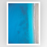 Photografiks Shot by Clint Ionian Sea 02 consignment art print displaying a scenic coastal landscape with blue waters and rocky shores.